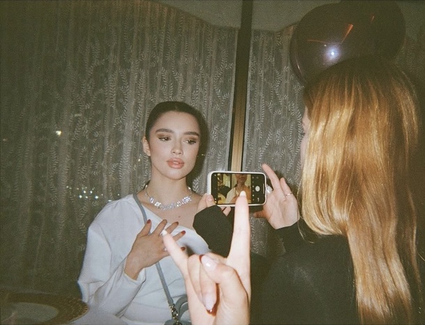 A candid photograph being taken