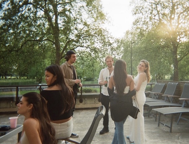 Friends on a sunlit terrace